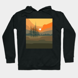 Stunning sunset behind trees in orange bright colors, minimalism style. Hoodie